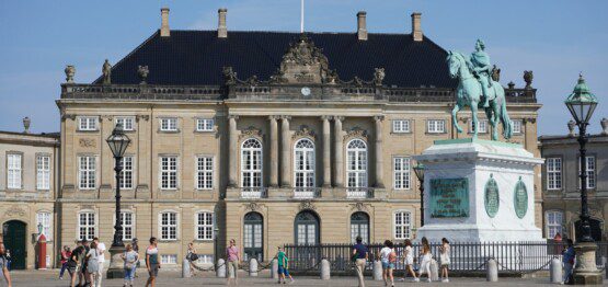 The royal residence, Amalienborg Palace, a cherished sight for tourists renting holiday apartments