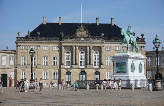 The royal residence, Amalienborg Palace, a cherished sight for tourists renting holiday apartments