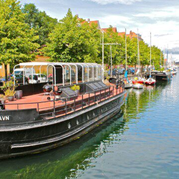 Explore Copenhagen's charming Christianshavn, perfect for finding holiday rentals along its picturesque canals