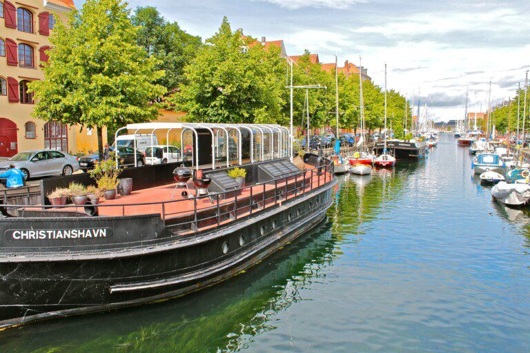 Explore Copenhagen's charming Christianshavn, perfect for finding holiday rentals along its picturesque canals