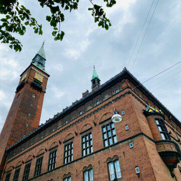 Copenhagen City Hall tower, a central landmark for tourists staying in central Copenhagen accommodations