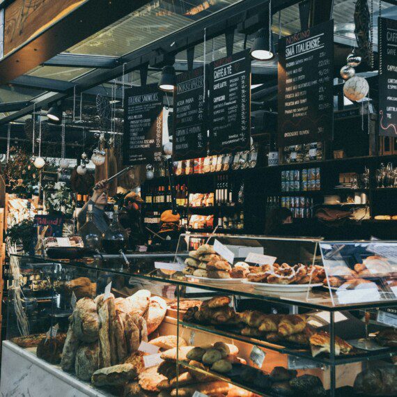 Danish pastries and bread at a bakery stand in Torvehallerne, Copenhagen – popular with tourists staying in nearby holiday apartments