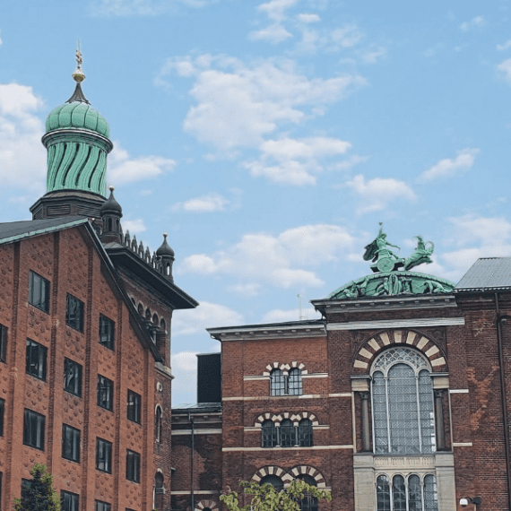 View of Carlsberg City District, featuring a blend of historic and modern architecture with numerous holiday apartments nearby