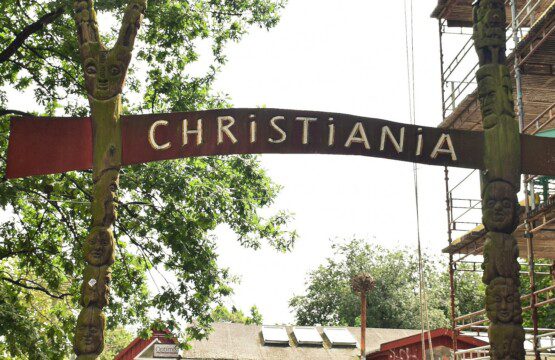 Main entrance to Christiania, Copenhagen, showing the iconic gate of the Freetown community