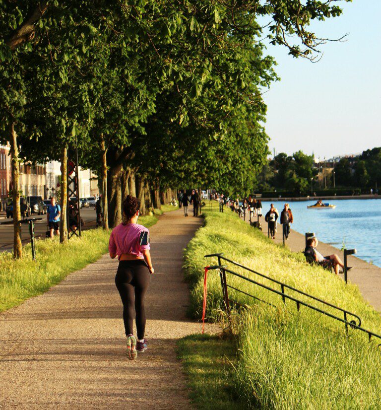 Woman jogging near the lake