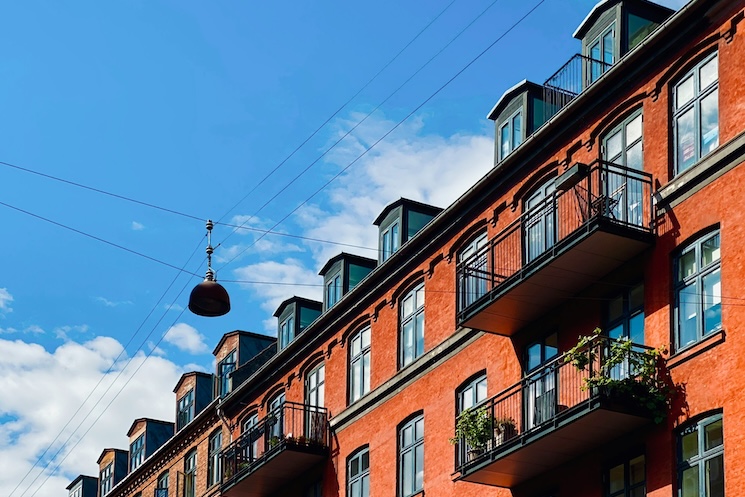 Colourful apartment building with balconies in Østerbro, one of the most popular neighbourhoods in Copenhagen