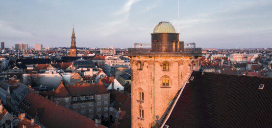 Arial view of the Round Tower in Copenhagen city centre, with nearby holiday apartments